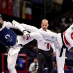 Henrique Marques, beneficiário do programa Bolsa Atleta, é campeão mundial de taekwondo na categoria até 80kg | Diário Carioca Com apoio do Bolsa Atleta, Henrique Marques conquistou o ouro e seu primeiro título mundial. É o segundo topo do pódio do país no torneio – algo inédito para o Brasil em Mundiais – e a primeira conquista do taekwondo masculino do país em toda a história da competição. Foto: Miriam Jeske/COB